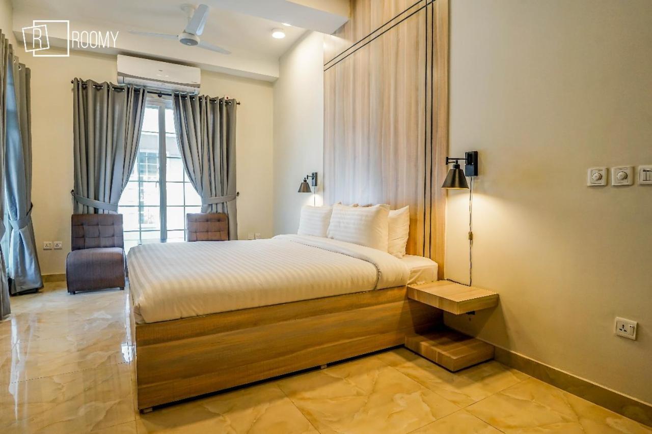 Roomy Crossroads Hotel, Peshawar Bagian luar foto